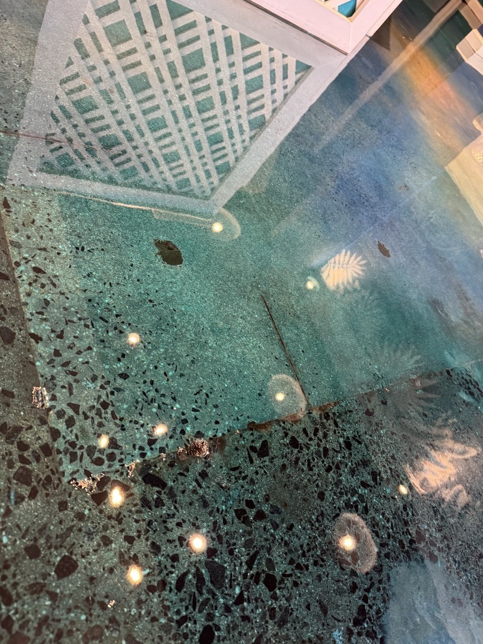 Teal terrazzo polished floor detail