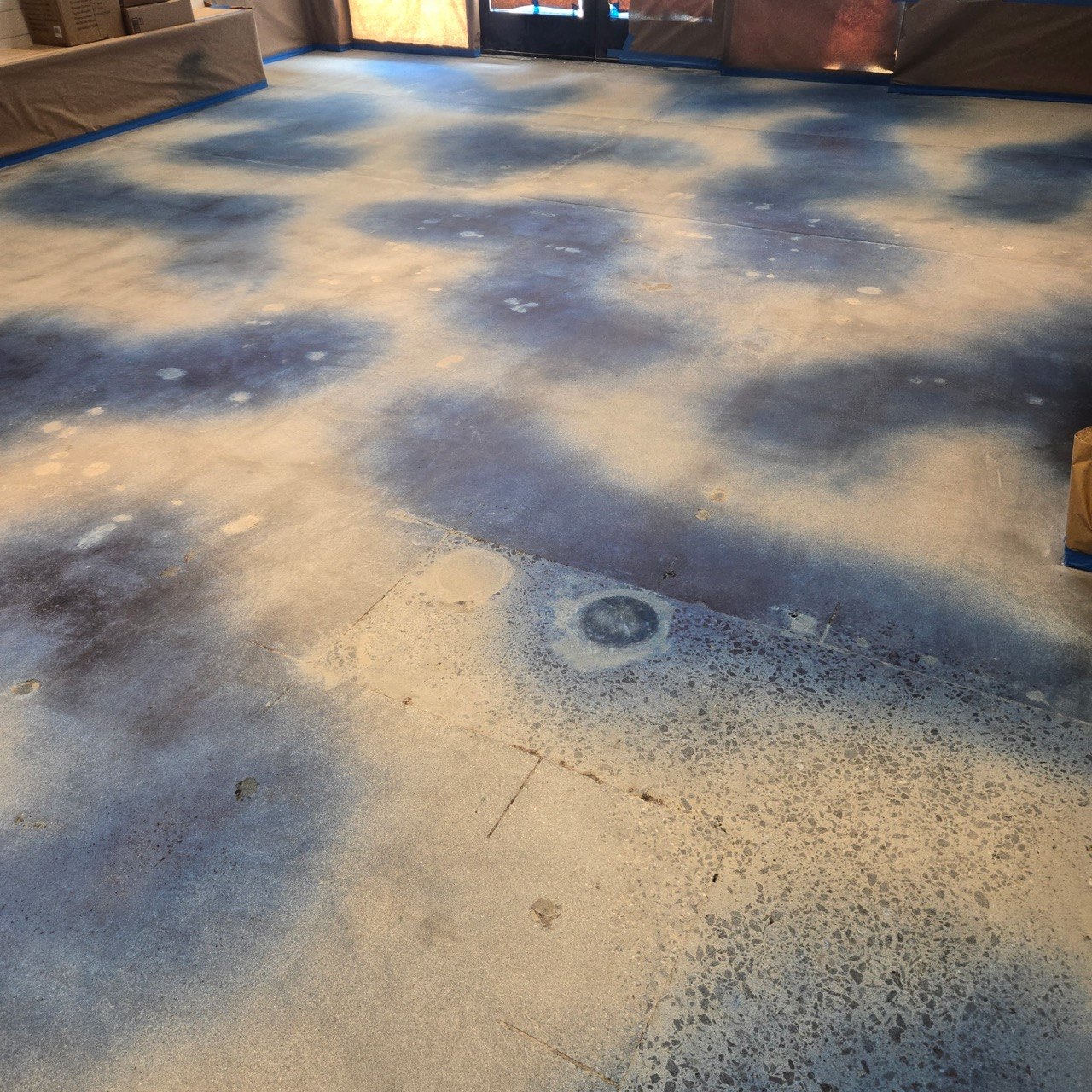 Blue cloud pattern acid-stained concrete